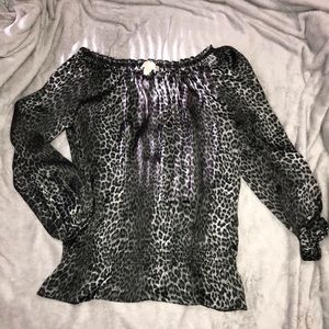 Animal print blouse.